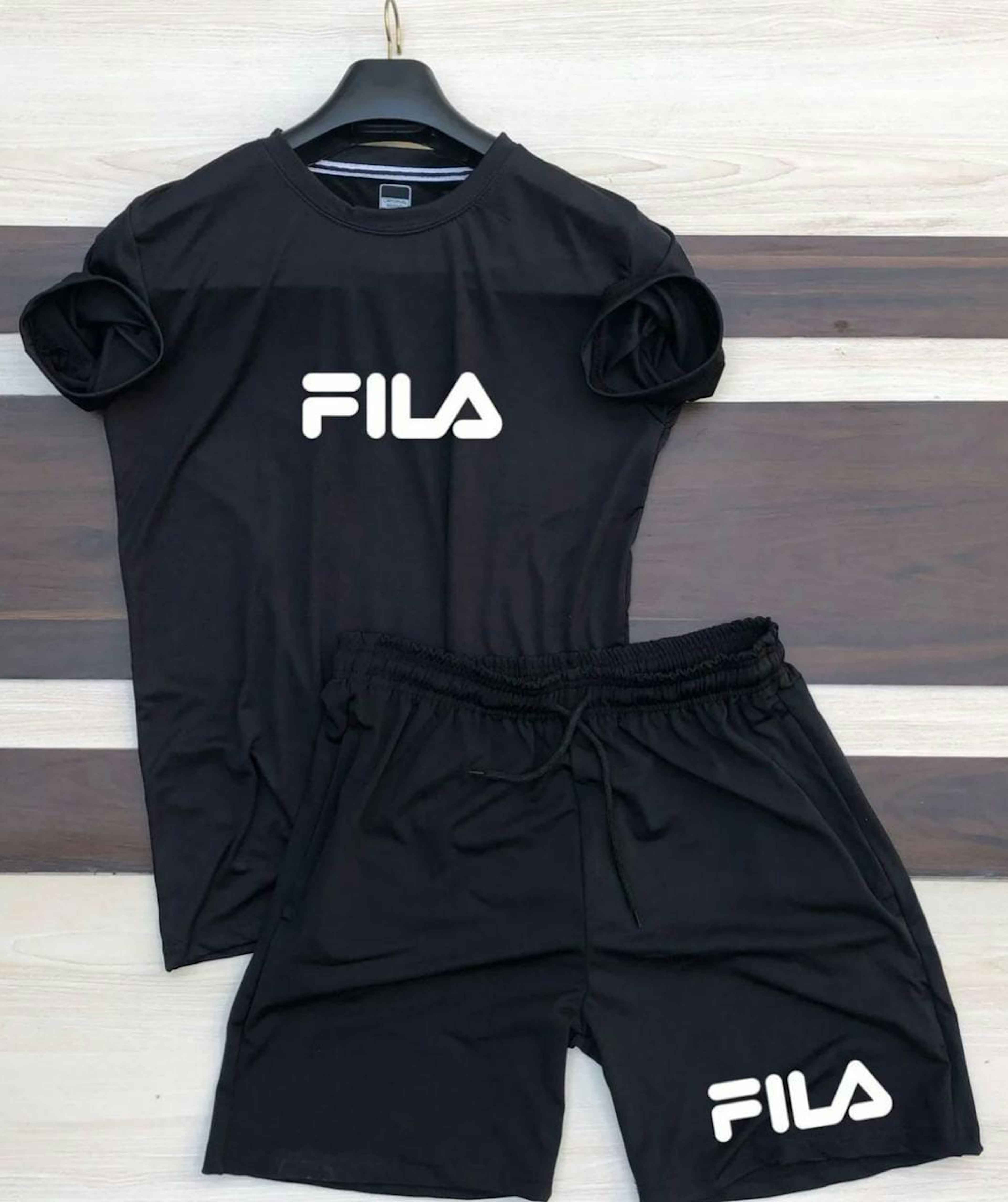 View - Fila T-Shirt and Shorts photos, Fila T-Shirt and Shorts available in Surat, make deal in 399