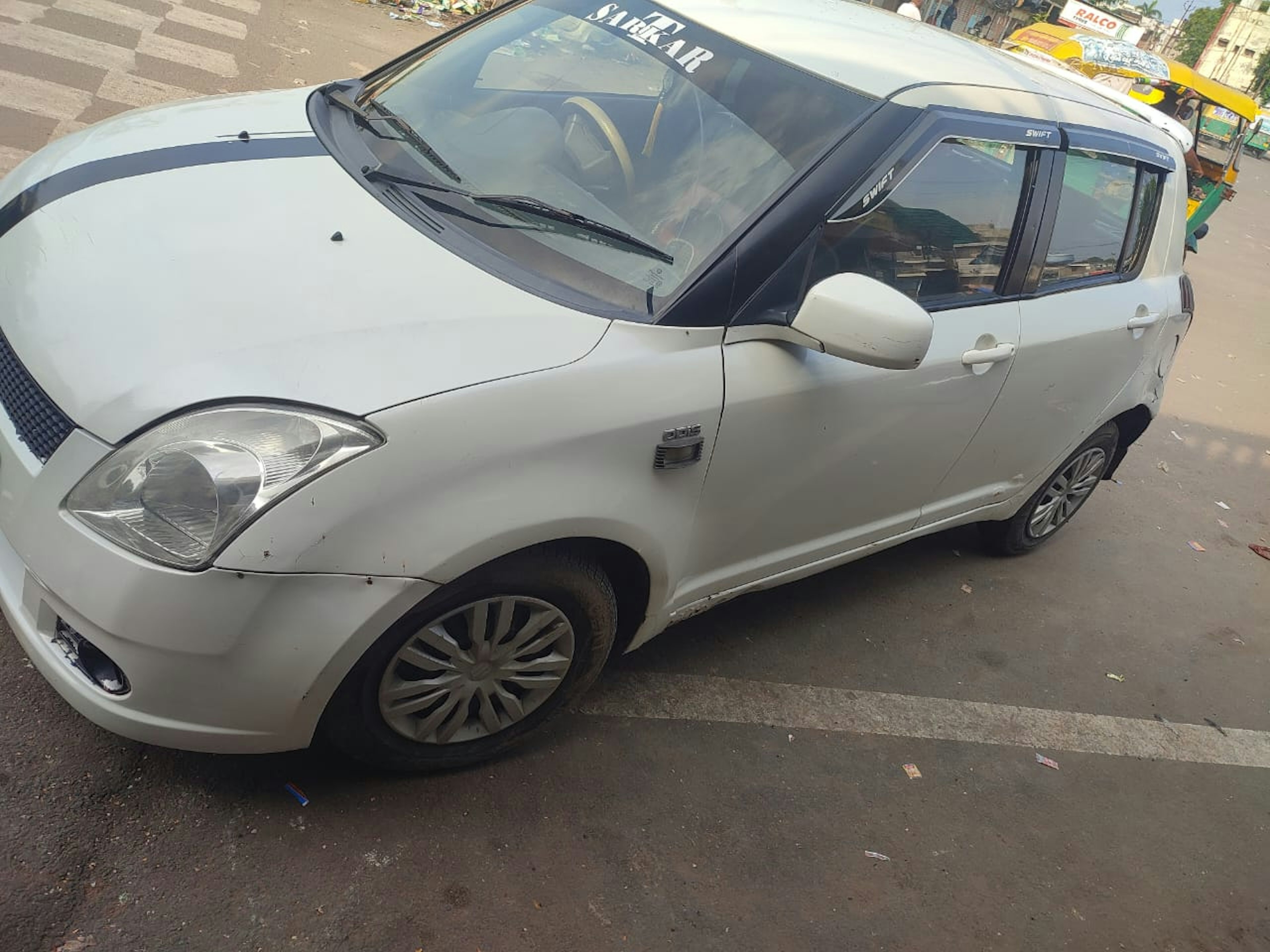View - swift car photos, swift car available in Ahmedabad, make deal in 170000